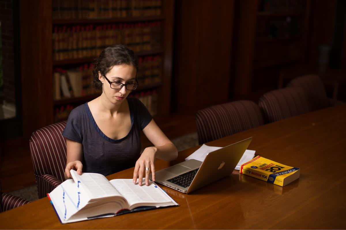 Student works on computer in the library